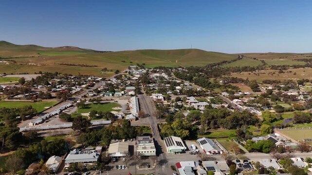 Burra, South Australia &ndash; 4K Aerial Drone Footage of Historic Pastoral Town, Country Houses, Estates, Streets, Canola Fields, and Wind Turbines in the Mid-North Agricultural Region