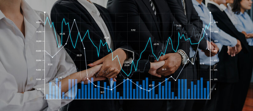 A diverse business team stands confidently in a corporate environment, with a digital stock market chart overlay illustrating analysis, growth, and strategies for success. Scalp - Powered by Adobe