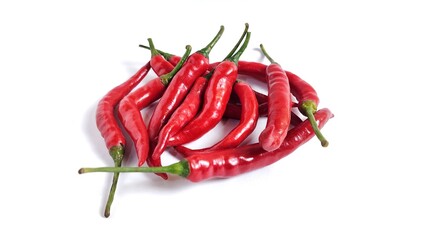 Red hot chili peppers isolated on white background with copy space. Clipping path. Perfect for design element, spicy food concept or any commercial usages. 