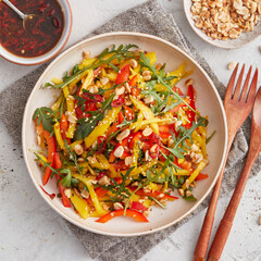 Thai salad with mango and peanut dressing