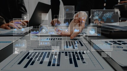 A collaborative business meeting showcases digital analytics visualizations, highlighting data-driven decision-making and teamwork in a modern office setting. Raster