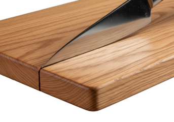 Macro of a light brown wooden cutting board with pronounced grain and sharp diagonal knife cut, isolated on gray, dramatic studio lighting, concept of material study and texture