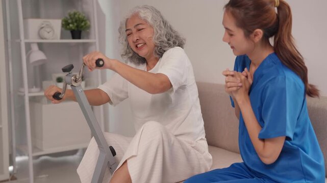 Asian Elder Woman Rehabilitation Exercise Caregiver Support Happy Patient Physical Therapy Session Home Wellness