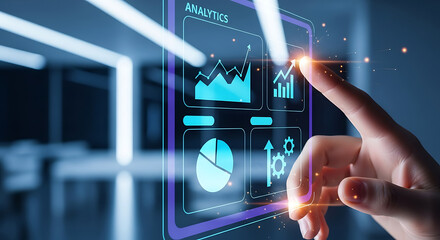 A hand interacting with a digital interface displaying analytics charts and graphs on screen