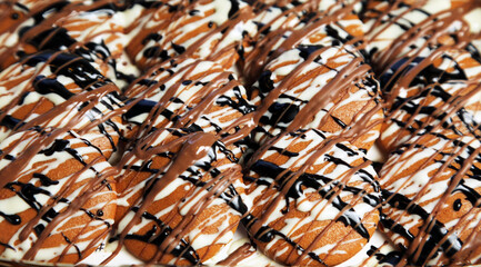 mini pancake with chocolate syrup dressing background