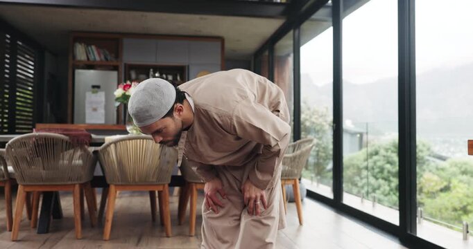 Muslim, man and praying for faith with worship, salah or prayer routine with Islam in home. Respect, devotion and Islamic person bowing in house for gratitude, trust in God or Allah for religion