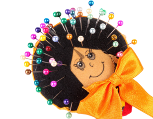 Whimsical Pin Cushion Doll with Colorful Pins and Bow.
