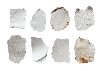 Nine irregular pieces of torn, light-beige textured paper