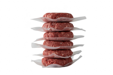 Stack of raw beef burger patties isolated on transparent background