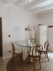 Serene Dining Room. Mediterranean-Inspired Interior with Warm Wood Furniture and Natural Accents