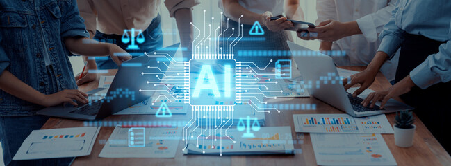 Engaged professionals collaborate in a vibrant meeting setting, utilizing laptops and AI technology, demonstrating innovation and teamwork in a dynamic workspace. Trope