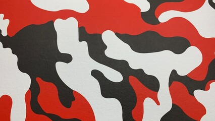 Bold red, white, and black camouflage pattern creates a striking abstract background or design element