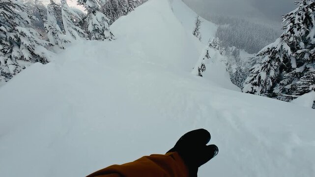 Snowboarder Riding High Mountain Ridge with Scenic View