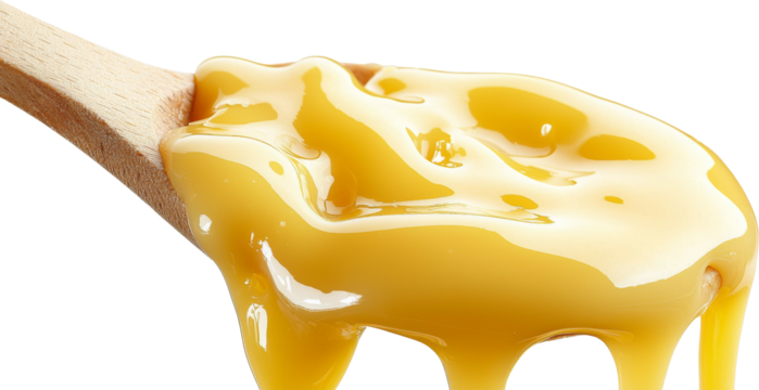 cheese dripping from a spoon