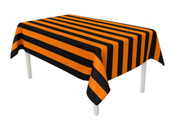 Table with orange and black striped halloween tablecloth