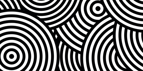 Abstract black and white concentric circles pattern, creating a visually dynamic and hypnotic design.