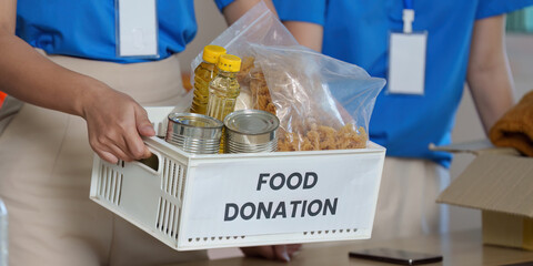 Food Donation Efforts. Volunteers preparing food donation items for community outreach.