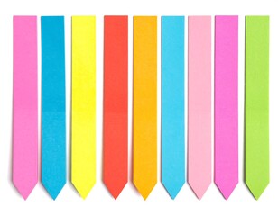 Collection of colorful, rectangular sticky notes arranged on a white background