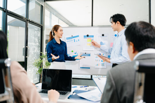 Business team discuss at meeting room. working together with laptop ,tablet and smart phone on desk Financial accountant , planner , meeting , introduction concept. At office - Powered by Adobe