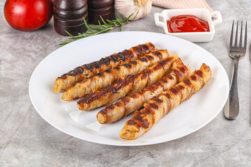 Grilled meat sausages wrapped bacon