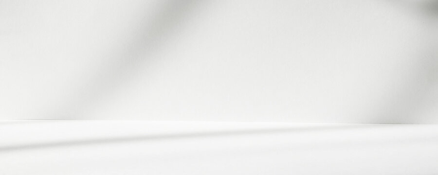Abstract white studio background with shadows of window. Empty 3d room. Display product with blurred backdrop. Banner