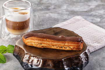 Gourmet chocolate eclair with icing
