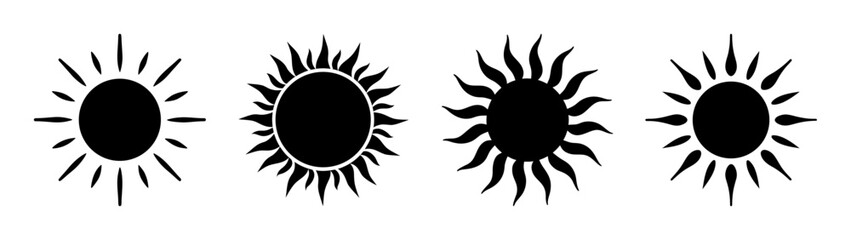 Set of four stylized black sun icons with radiating rays diverse shapes and sizes