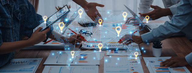 Concept of a global logistics network with location pins on a world map. This represents an international supply chain and distributed business locations for worldwide reach. Fermion