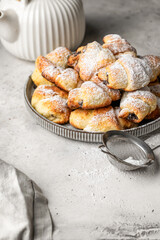 Mini croissant cottage cheese cookies with poppy seed filling. Delicious homemade dessert bagels