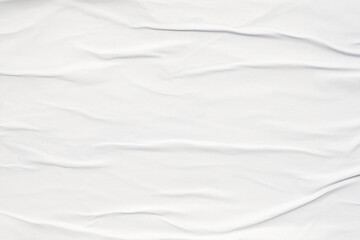 white crumpled and creased glued wrinkled paper poster texture background