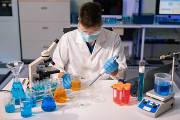 Fototapeta premium Glass vial, pipette and scientist in laboratory for medical study, research or experiment.