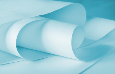 
Long sheets of paper from a roll of blue tone.