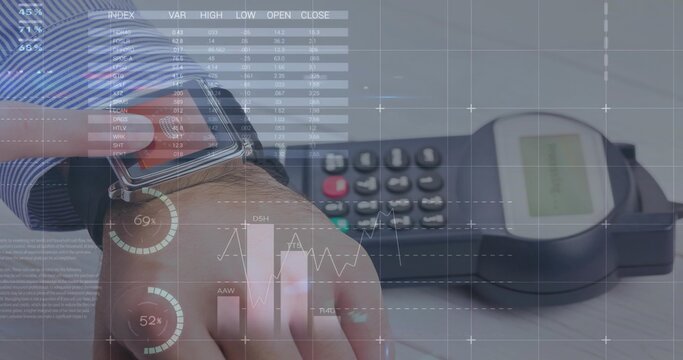 Holding wrist wearing smartwatch over payment terminal, shirt cuff showing, with financial overlay