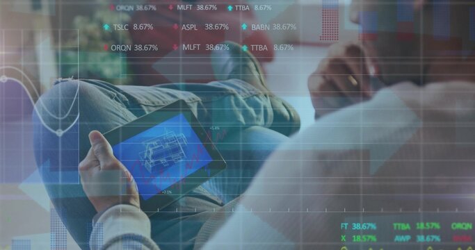 Reclining Asian man examining 3D building blueprint on tablet at home office, with ticker overlay - Powered by Adobe