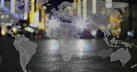 Overlaying transparent world map on wet city road at night, showing blurred lights and hex pattern