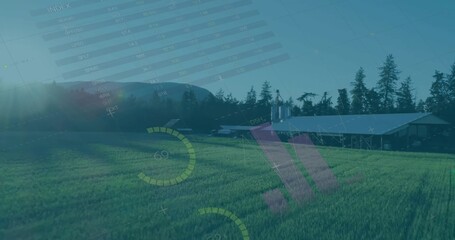 Showing sunlit rural meadow featuring metal-roofed barn and silos on right, with digital overlay