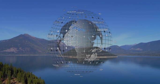 Hovering digital globe wireframe floating above lake in mountain valley, with numeric data labels