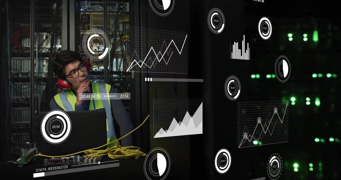 Monitoring Korean technician wearing safety gear in data center LED-lit server racks, copy space
