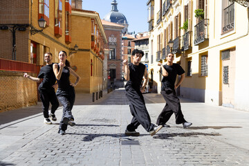 Group of dancers performing urban street dance in madrid