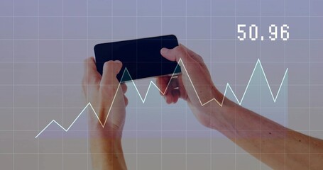 Hands grasping black smartphone horizontally in studio, with grid overlay, line graph reading 50 © vectorfusionart