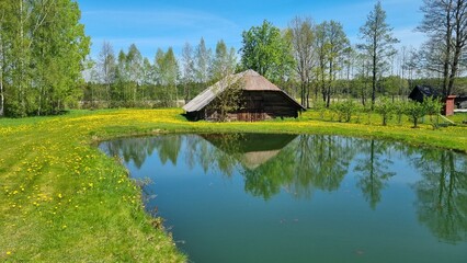 Obraz premium house on the river