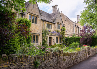 Traditional cottage with wisteria and garden in Bourton-on-the-Water England