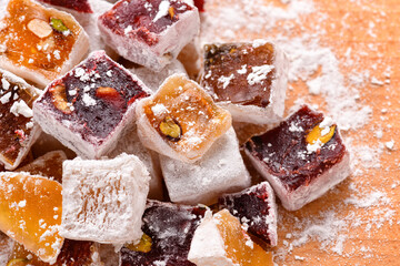 Sweet food Turkish delight, assorted rahat locum in form of cubes with nuts and powdered sugar, traditional food