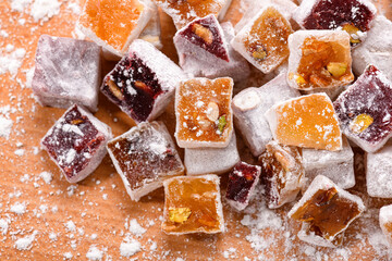 Sweet food Turkish delight, assorted rahat locum in form of cubes with nuts and powdered sugar, traditional food