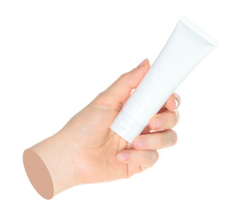 Woman hand holds a white cosmetic cream tube, on transparent background close-up, template for cosmetics ads. Contemporary art