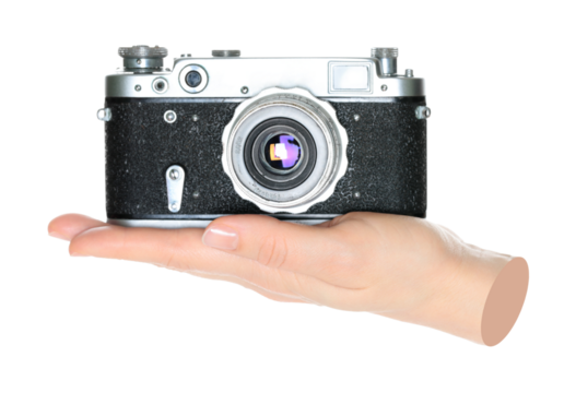 Women hand holds a retro photo camera, isolated on transparent background, front view, retro things concept. Contemporary art - Powered by Adobe