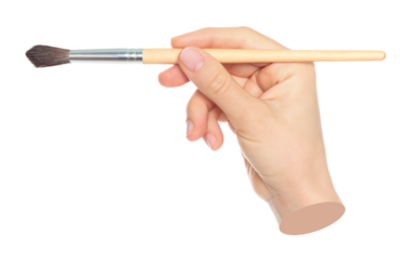 Woman hand holds paint brush, isolated on transparent background, painting and design concept. Contemporary art