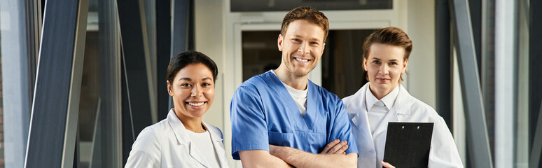 Fototapeta premium Multicultural medical team showcases collaboration in modern healthcare setting