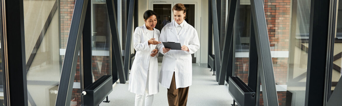 Doctors discussing results in a hospital, collaborating on patient care