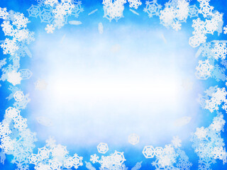 雪の結晶が舞う青く幻想的なフレーム